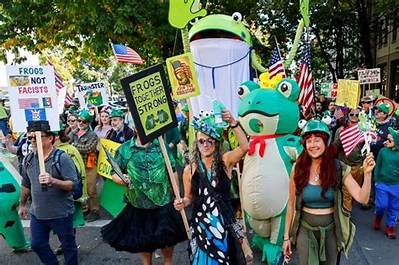 Behind the Frog Suits: Why Activists Are Standing up in Costumes at Major Political Events