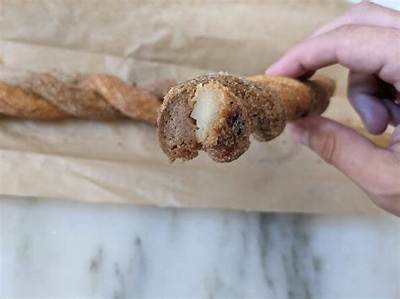 Straight Vs. Twisted: Proof of How Costco Changed Its Iconic Churro